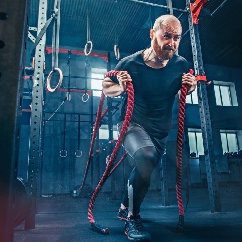 men-with-battle-rope-battle-ropes-exercise-in-the-fitness-gym-crossfit-.jpg